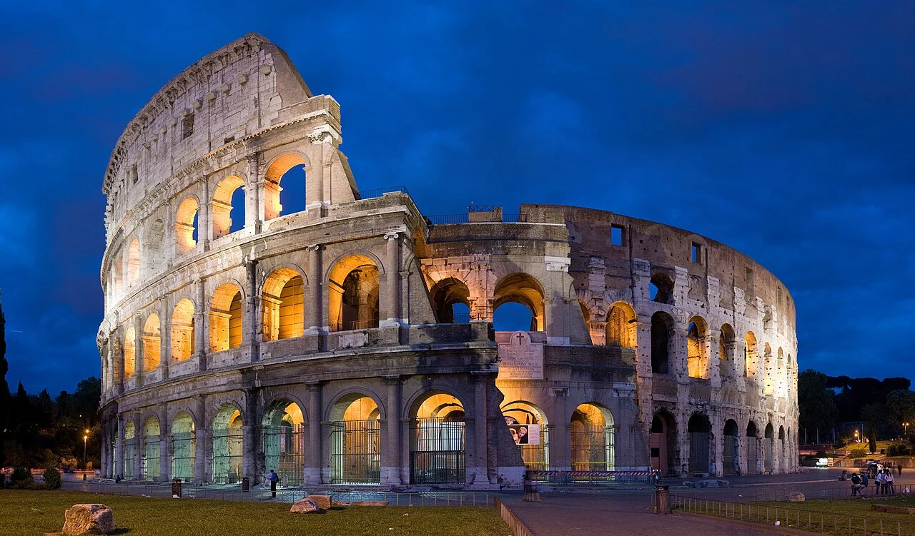 Colosseum in Rome illuminated at dusk