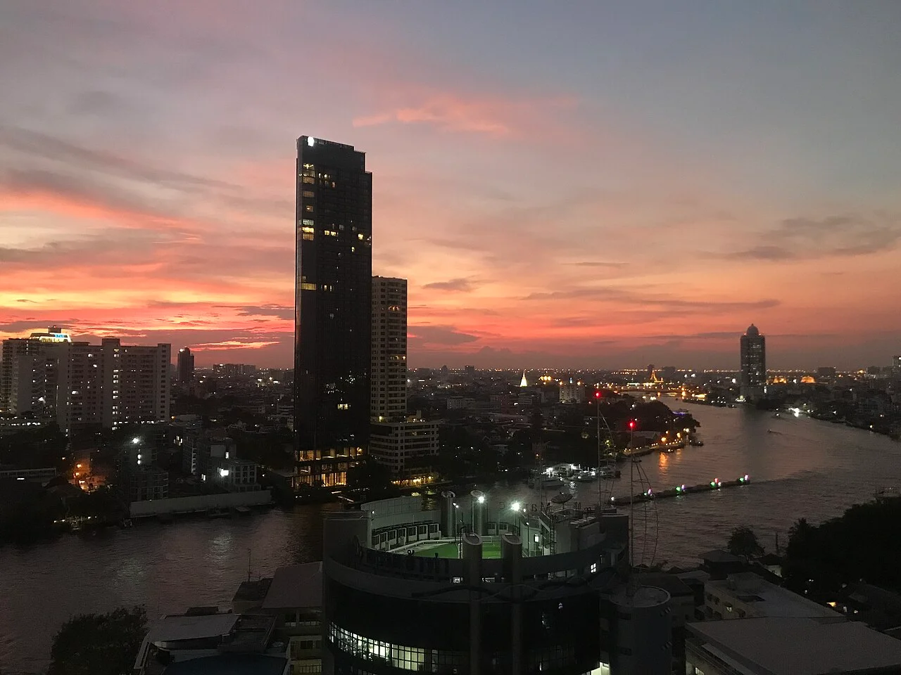 Chao Phraya River and Bangkok skyline at sunset from Talat Noi