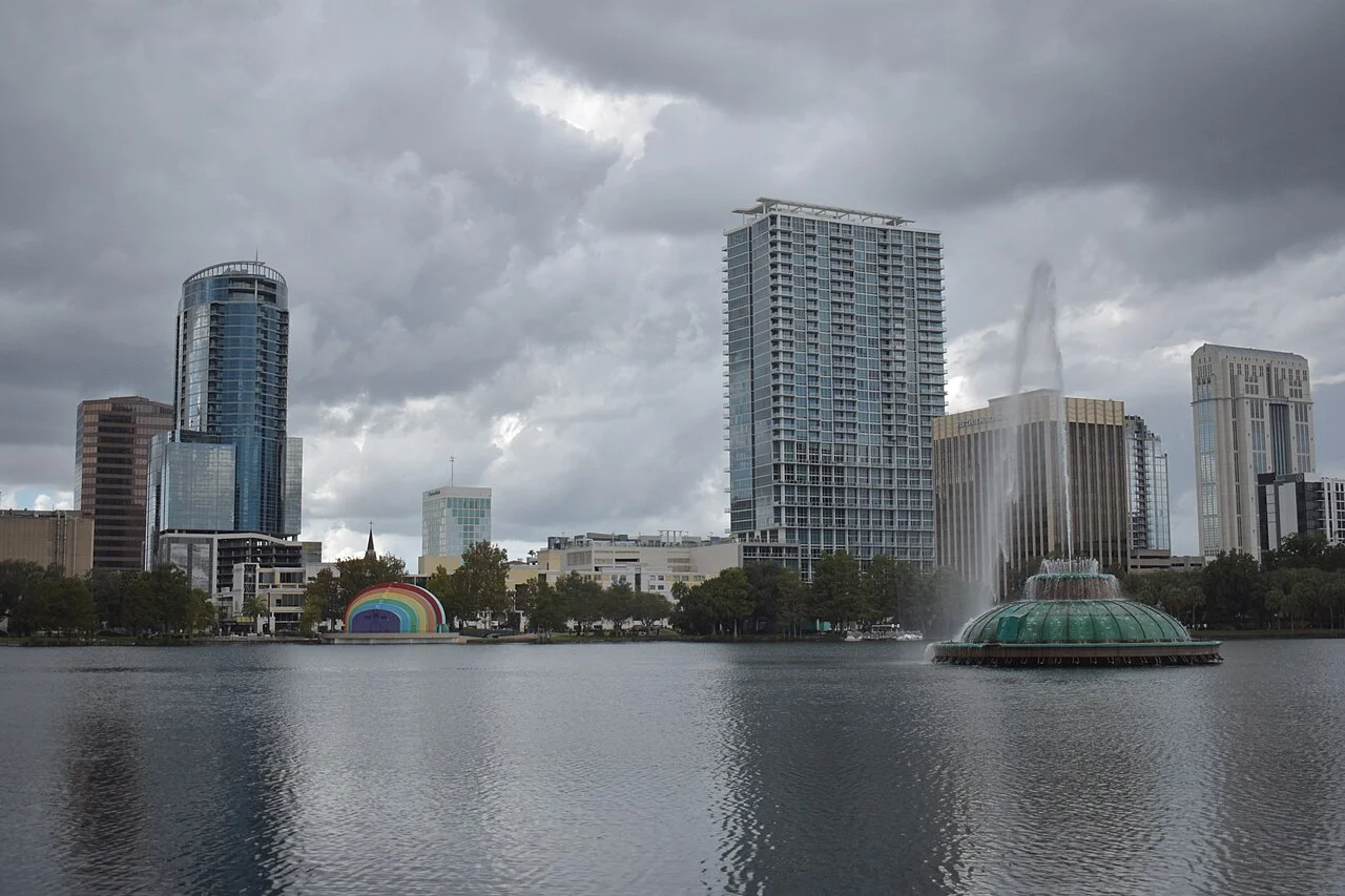 Orlando skyline and fountain across Lake Eola