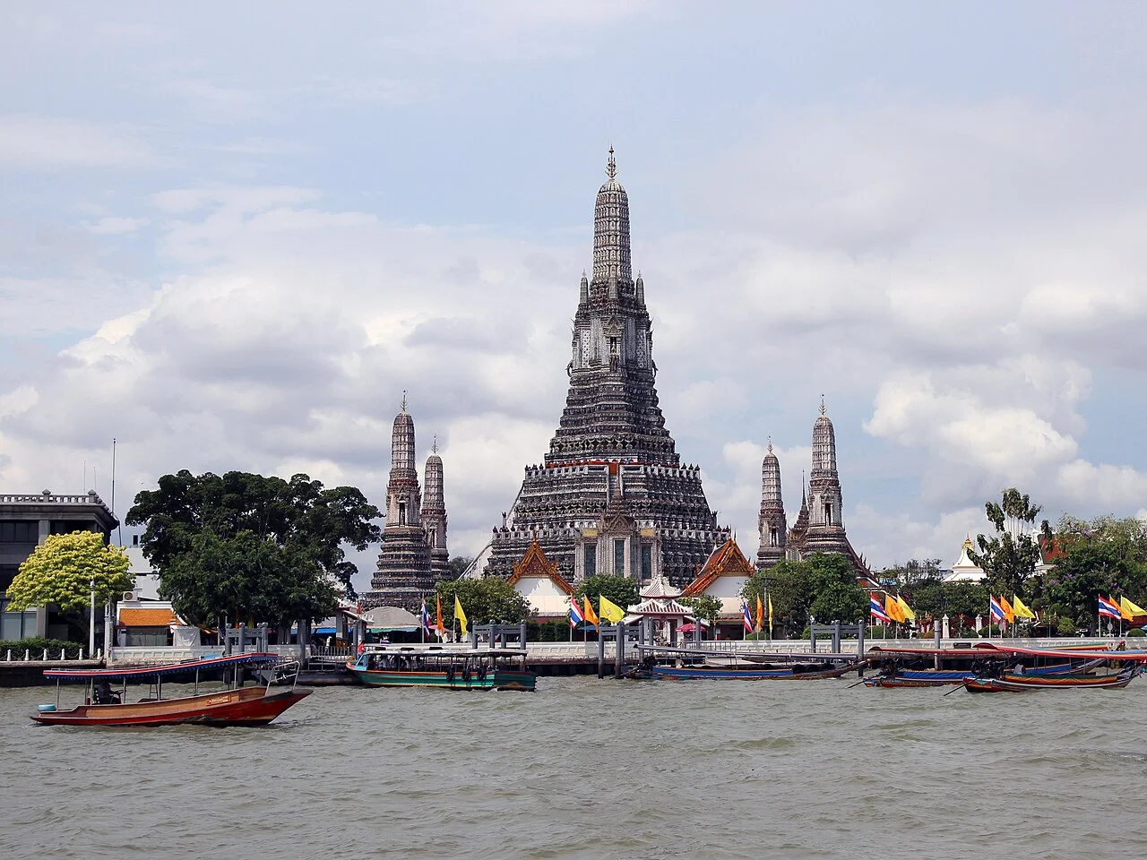 Wat Arun temple across the Chao Phraya River in Bangkok