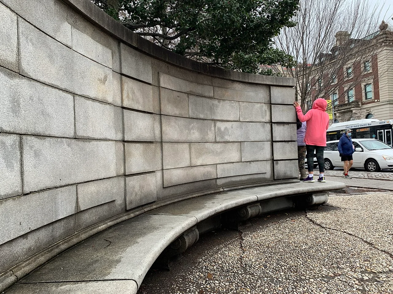 Engineers Gate entrance and stone wall on the east side of Central Park